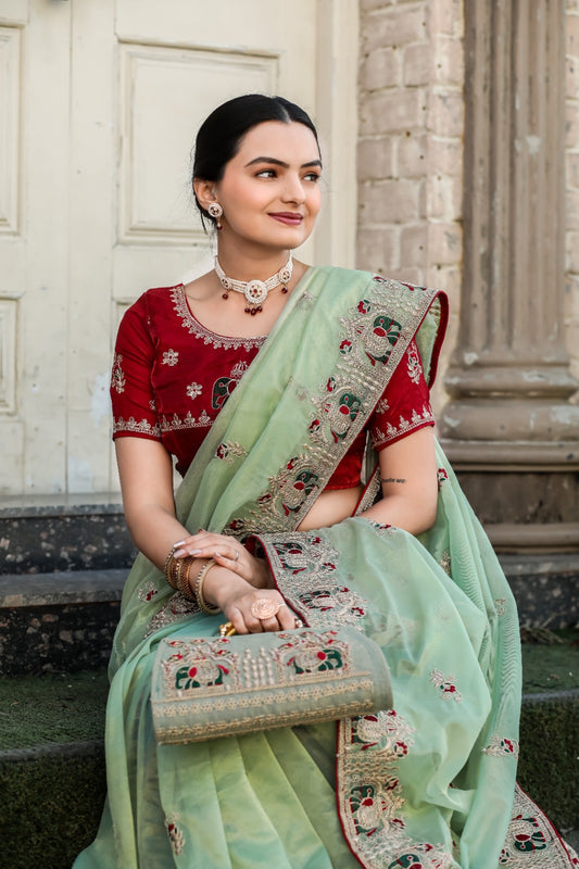 Gajanand Green Net Saree with Heavy Embroidered Border